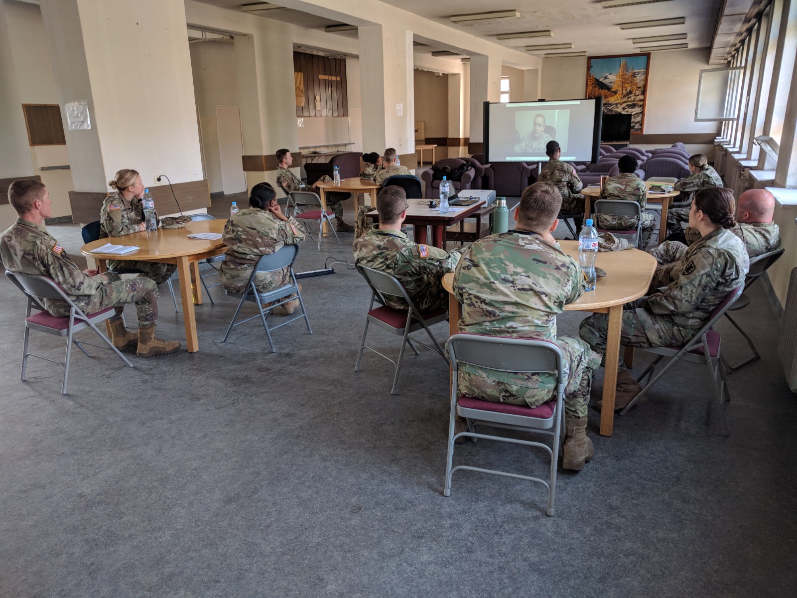 Officers from the 53rd Manuever Control Battalion listen to a leader talk about his real challenges in working with partnered forces.