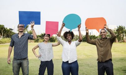 Diverse friends holding speech bubbles Diverse friends holding speech bubbles