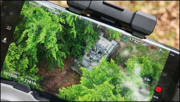 Static BLUFOR armored vehicle detectable and unprotected from above. Skynet launched sorties of UAS equipped with dropped munitions, targeting the open hatches and destroying the vehicles.